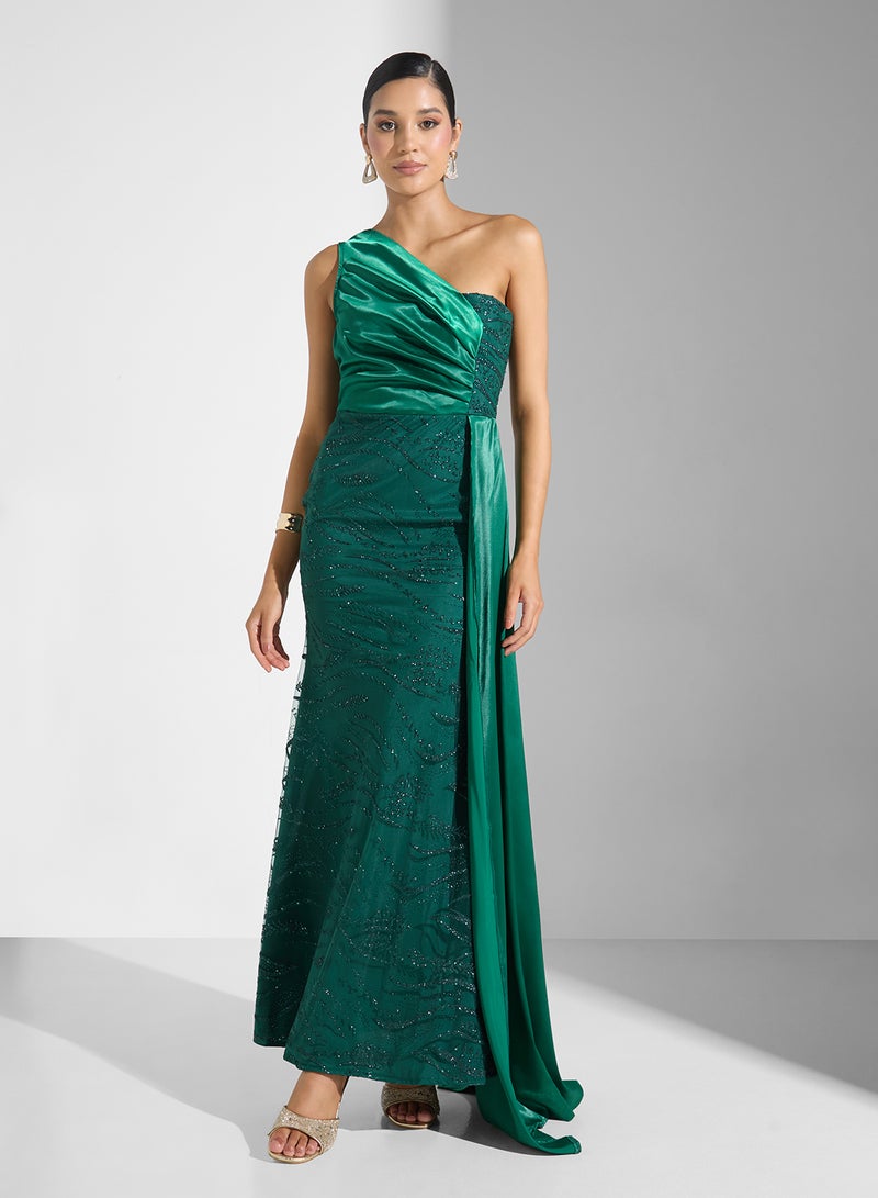 namshi-x-one-shoulder-shimmer-dress-with-trail-1 Namshi x One Shoulder Shimmer Dress With Trail 1